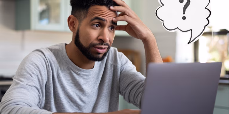 man researching common moving company myths in ohio